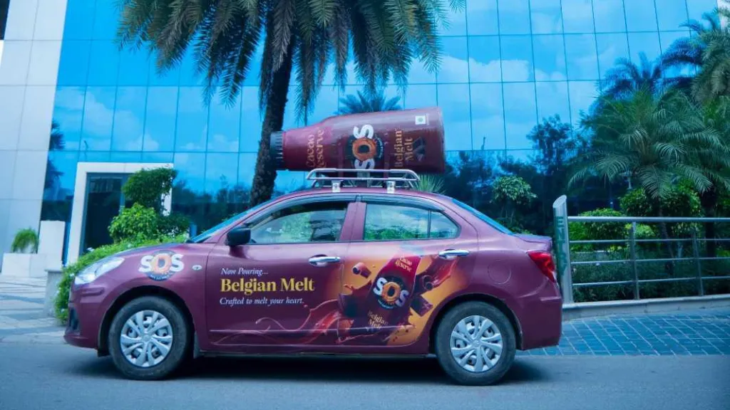 How FMCG Brands Are Driving Mobile-First Awareness via Cab Branding SOS Flavoured Milk 3D Cab Branding Campaign